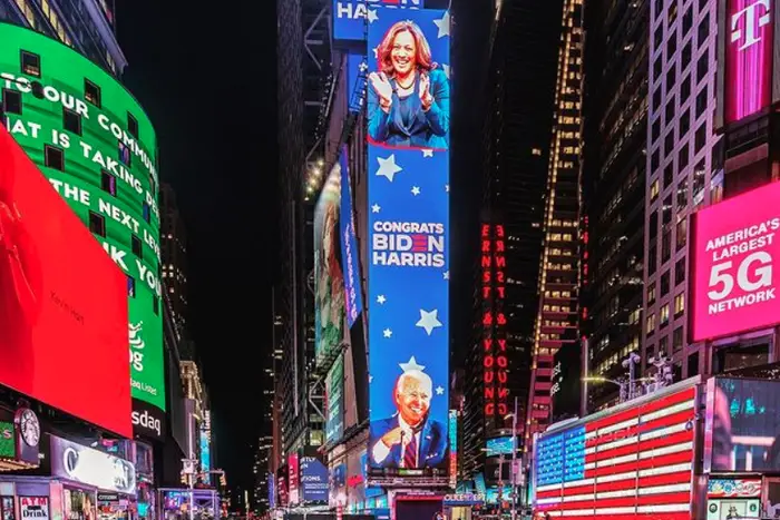 a digital billboard in Times Square congratulations Joe Biden and Kamala Harris on the inauguration.